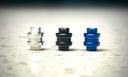 Benchmade Bugout anodized aluminum backspacers — Black, Blue, and Silver